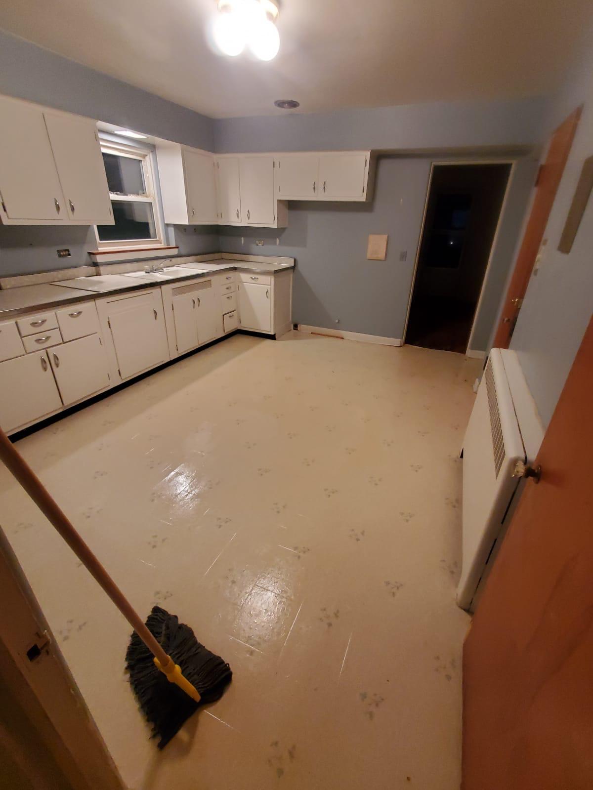 Hoarding cleanup after photo - clean kitchen restored in Chicago suburbs